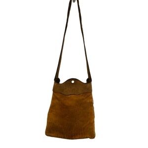Vintage, possibly hand made,rustic tooled leather pouch with shoulder strap.